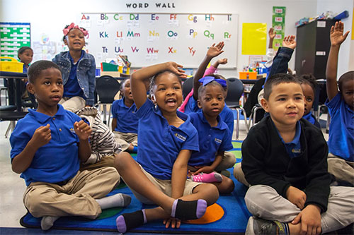 kipp-500w-kidsraisinghands